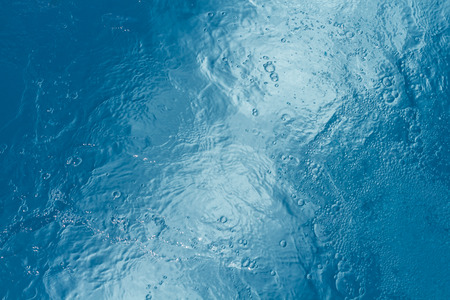Beautiful pattern of blue water reflecting the sun.の写真素材