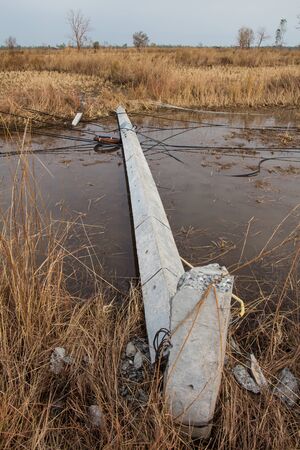 The broken power poles until the structure is made of steel. Caused by windstorm.の写真素材