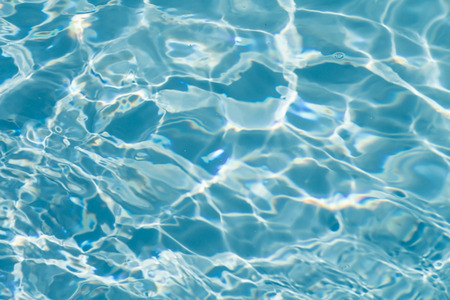 Beautiful pattern of blue water reflecting the sun.の写真素材