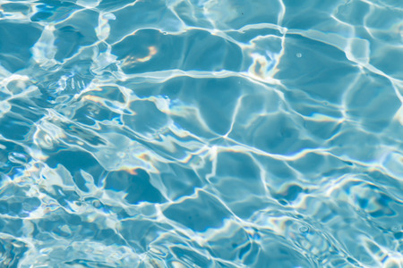 Beautiful pattern of blue water reflecting the sun.の写真素材