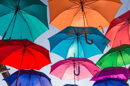 Umbrella floating in the blue skyの写真素材