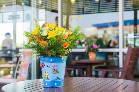 Decorative flower on the wood tableの写真素材