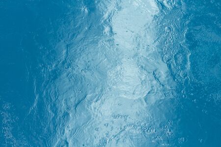 Beautiful pattern of blue water reflecting the sun.の写真素材