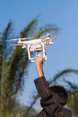 NONGKHAI, THAILAND - JAN 3 , 2016 : Teachers are teaching children how to properly release drones.