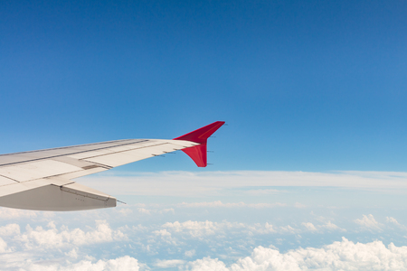 View from a window seat in cabin of the aircraft.の写真素材