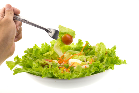 Fresh salad on a bowl  on white backgrund.の写真素材