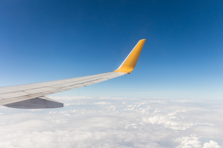 View from a window seat in cabin of the aircraft.の写真素材