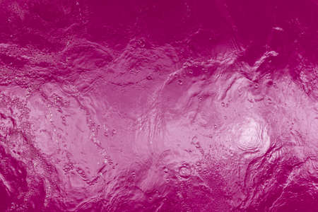 Beautiful pattern of  color water reflecting the sun.の写真素材