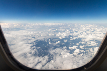View from a window seat in cabin of the aircraft.の写真素材
