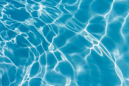Pattern of blue water reflecting the sun.