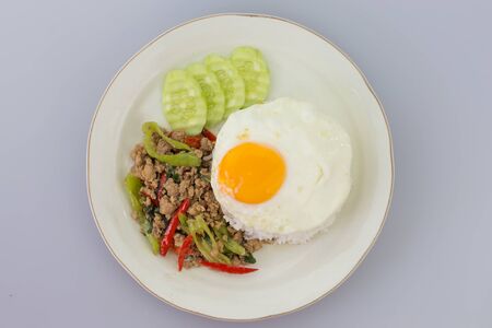 Thai food,Fried pork with sweet basil.Fast food in Thailand and eaten anywhere in the country.の写真素材