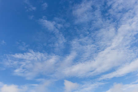 Cloudy with a bizarre shape on blue sky background.の写真素材