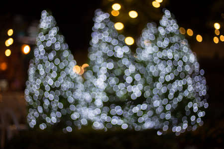 Defocus light from a light bulb decked in Christmas.の写真素材