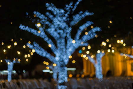 Defocus light from a light bulb decked in Christmas.の写真素材