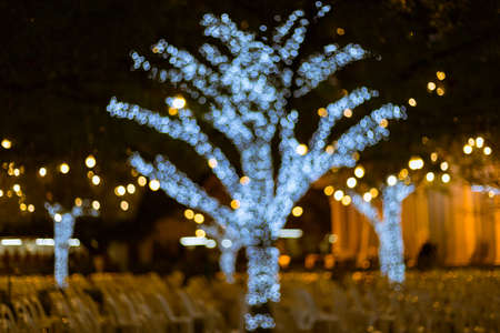 Defocus light from a light bulb decked in Christmas.の写真素材