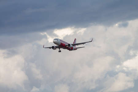 UDONTHANI, THAILAND - MAY 22, 2015: HS-BBO Airbus A320-216 of Thai Air Asia landing from Don Mueang to Udonthani International Airport Thailand. Thai Air Asia company is the low cost airlines.のeditorial素材