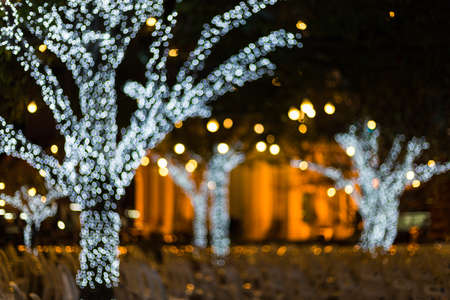 Defocus light from a light bulb decked in Christmas.の写真素材