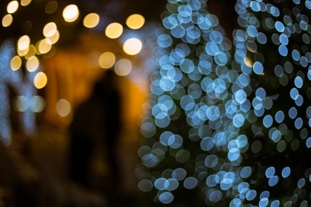 Abstract the couple lover and the light of bokeh christmas tree.の写真素材