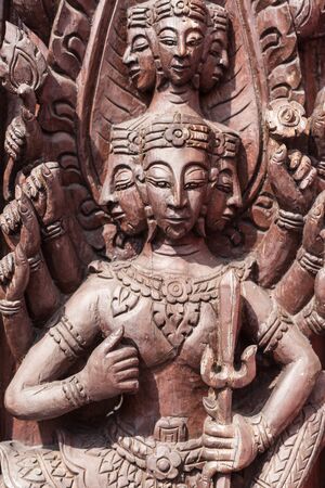 Murals, wood carvings, a Buddhist temple in Thailand.の写真素材