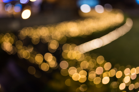 Defocus light from a light bulb decked in Christmas.の写真素材