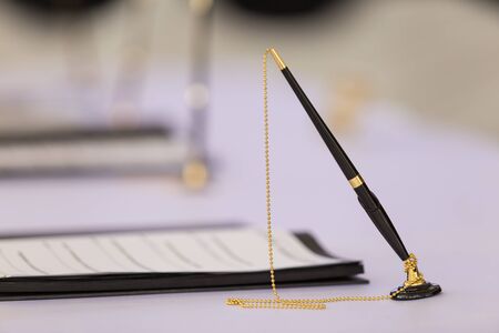 Desk pen stand for signing contracts.With copy space.の写真素材
