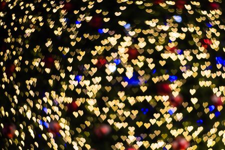 Color Bokeh heart shape backgroundの写真素材