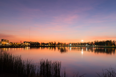 Beautiful lake and the city at twiligth time.の写真素材