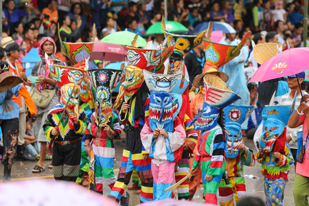 LOEI, Thailand - July 7, 2016 : The Phi Ta Khon annual festival beautiful parade.People dress in spirit and wear a ghost mask costume colorful, sing and dance at DANSAI LOEI province Thailand.のeditorial素材
