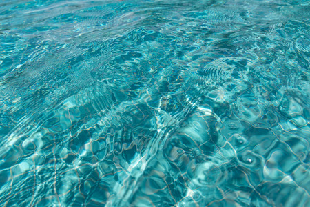 The surface of the water reflection in the pool.の写真素材