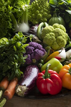 Large baking pan with fresh mixed colourful vegetablesの写真素材