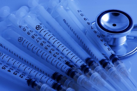 Medical Series - stethoscope and syringesの写真素材