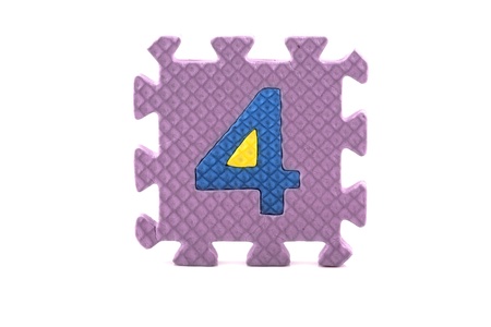 Alphabet puzzle pieces on white backgroundの写真素材