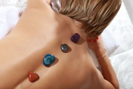 spa salon massage hot mineral stone treatment の写真素材