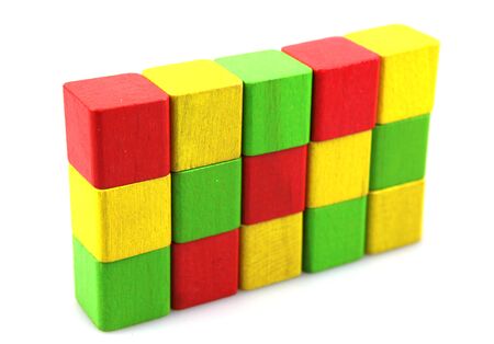 Wooden building blocks on white background