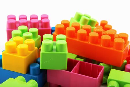 Plastic building blocks on a white backgroundの写真素材