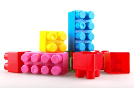 Plastic building blocks on a white backgroundの写真素材
