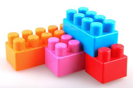 Plastic building blocks on a white backgroundの写真素材