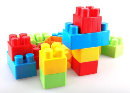 Plastic building blocks on a white backgroundの写真素材