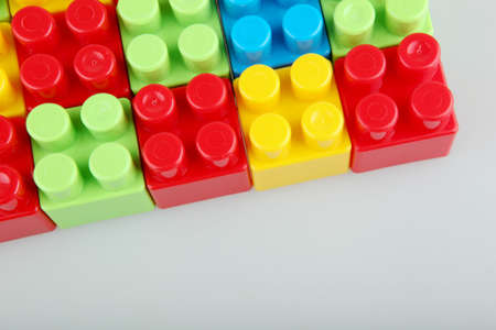 Plastic building blocks on a white backgroundの写真素材
