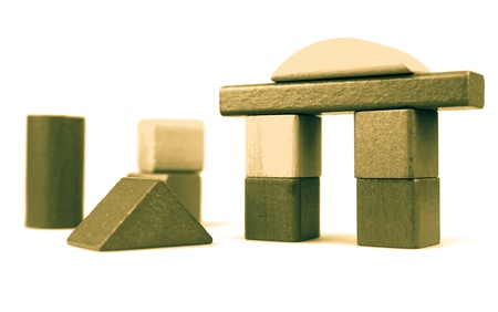 Wooden building blocks isolated on white background.