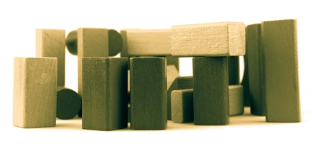 Wooden building blocks isolated on white background.