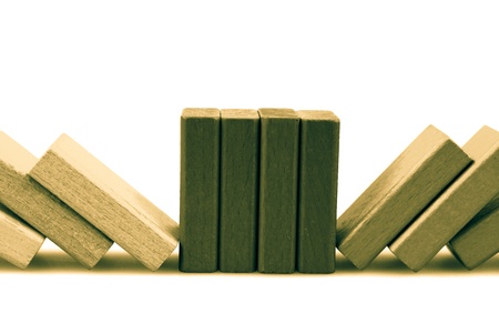 Wooden building blocks isolated on white background.