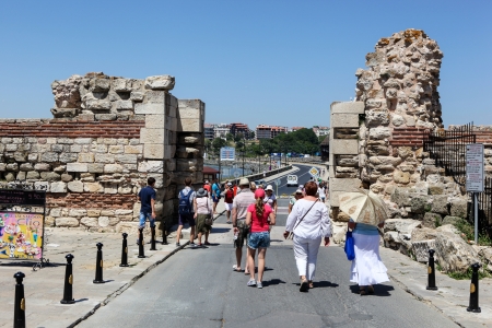 Nesebar, Bulgaria - 06/23/2013: People visit Old Town on June 23, 2013 day of Nessebar, Bulgaria. Nessebar in 1956 was declared as museum cityのeditorial素材