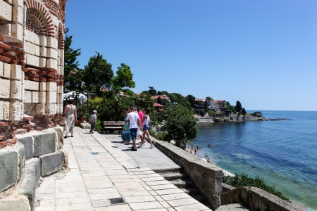 Nesebar, Bulgaria - 06/23/2013: People visit Old Town on June 23, 2013 day of Nessebar, Bulgaria. Nessebar in 1956 was declared as museum cityのeditorial素材