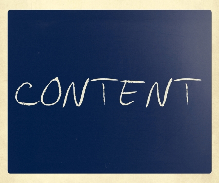 The word "Content" handwritten with white chalk on a blackboard.の写真素材