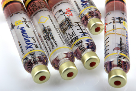 AYTOS, BULGARIA - MARCH 14, 2014: Insulin is a peptide hormone, produced by beta cells in the pancreas, and is central to regulating carbohydrate and fat metabolism in the body.のeditorial素材