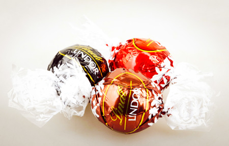 AYTOS, BULGARIA - APRIL 02, 2014: Milk Chocolate LINDOR truffle. Lindt & SprÃ¼ngli is recognized as a leader in the market for premium quality chocolate.のeditorial素材