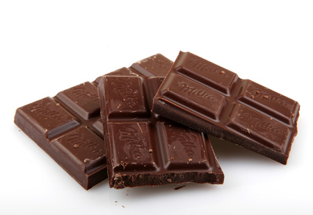 AYTOS, BULGARIA - MAY 05, 2014: Milka Dark Alpine milk chocolate. Milka is a traditional brand of chocolate confection, since October 2012 manufactured by MondelÄz International.のeditorial素材