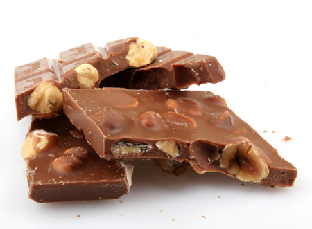 AYTOS, BULGARIA - MAY 05, 2014: Lindt Swiss milk chocolate with whole hazelnuts. Lindt is recognized as a leader in the market for premium quality chocolate.のeditorial素材