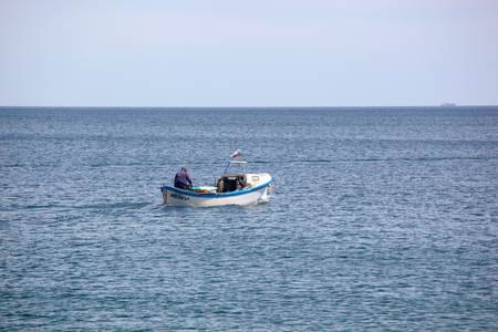 Pomorie, Bulgaria - May 01, 2019: Fishing Boat At Sea.のeditorial素材